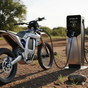 An electric dirt bike plugged into a fast charging station, showing the convenience of quick and easy power replenishment between rides.