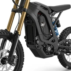 A detailed view of the steel frame and front and rear suspension system on a 36 volt electric dirt bike, built for durability.