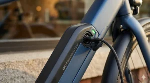 Close-up of a lithium-ion battery on an electric bike under $700 showing charging port.