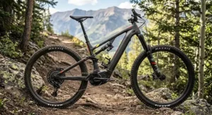 Profile view of a full-suspension electric mountain bike highlighting the steep seat tube angle and geometry ideal for uphill climbs.