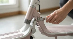 Close-up of the easy folding mechanism on a lightweight electric scooter for women.