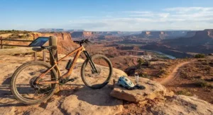 A hardtail eMTB parked against a scenic desert overlook in the American Southwest during a weekend ride.