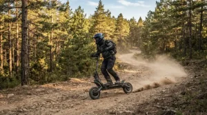 A rider carving a dusty corner on an off road electric scooter under $1500 during a sunny weekend trail ride.
