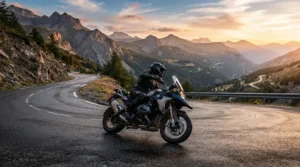 A sport rider leaning into a mountain curve while using a bluetooth helmet communicator for sport riders.