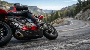 Action shot of a rider cornering hard, showcasing durable motorcycle riding boots for street fighter riders planted on the footpeg.