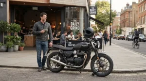 Rider standing casually outside a trendy downtown coffee shop wearing stylish motorcycle riding boots for street fighter riders.