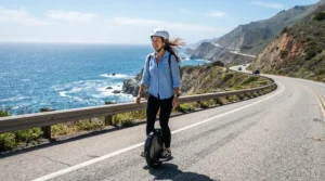 Cruising along a scenic coastal highway on a sport bike style electric moped for adults